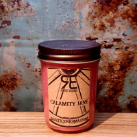 Calamity Jane handmade western candle — floral coconut soy candle in 8 oz jelly jar, Rustic Enigma New Mexico